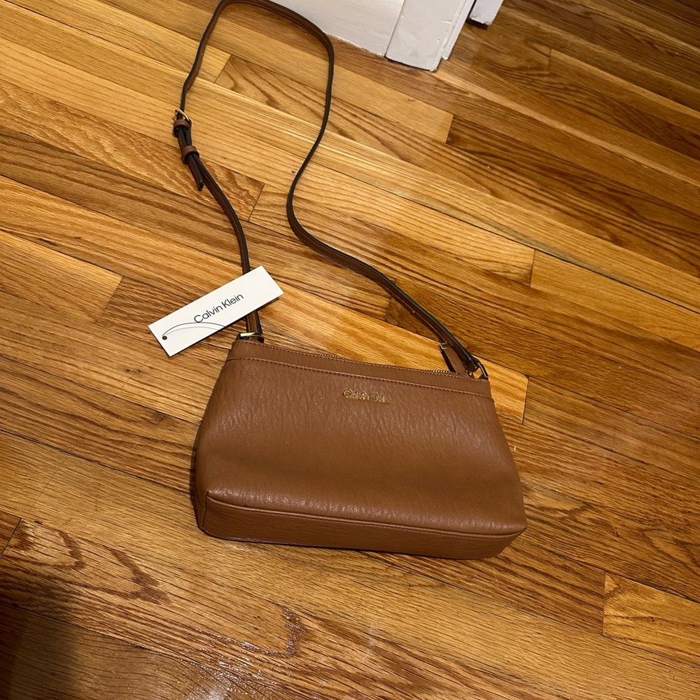Calvin Klein Brown Leather Crossbody Bag with Minimalist Design